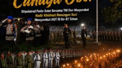 Di Bawah Cahaya Obor: Ditpolairud Polda Sulut Bersama TNI Dan Masyarakat Hadir Khidmat Renungan Suci Menyambut HUT RI Ke-81 Tahun